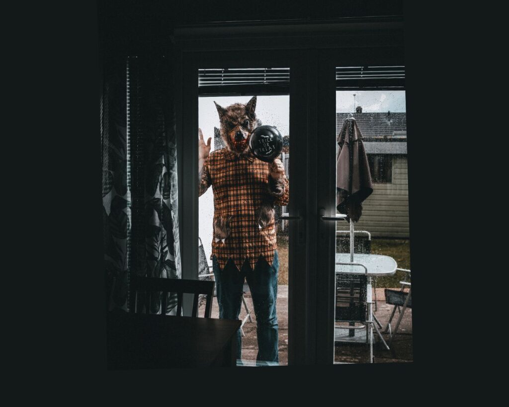 A wolfman is trick or treating around Halloween. It's a little scary.