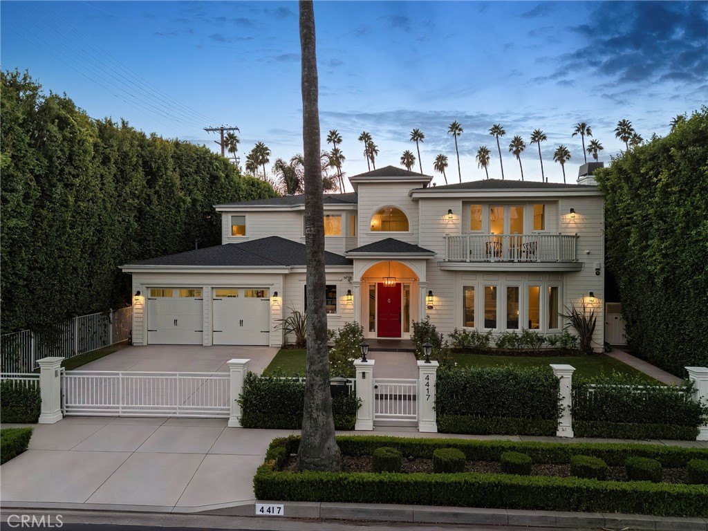 Gated front exterior of 4417 Atoll Avenue in Sherman Oaks at dusk