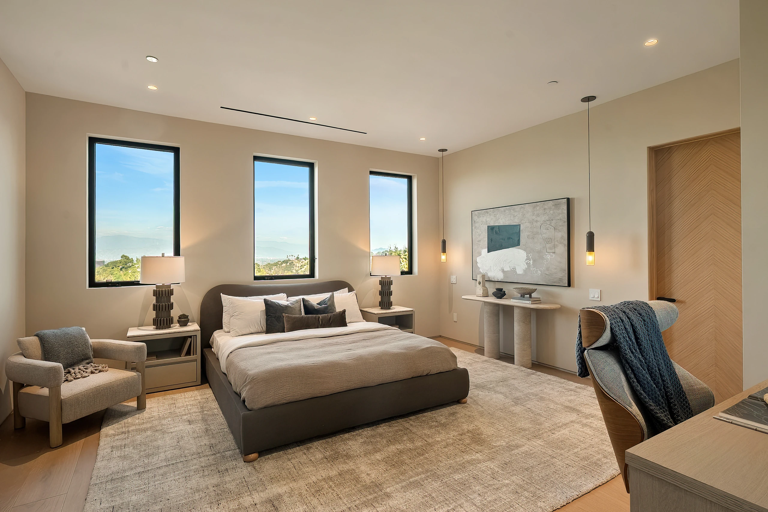 A second bedroom with corner windows