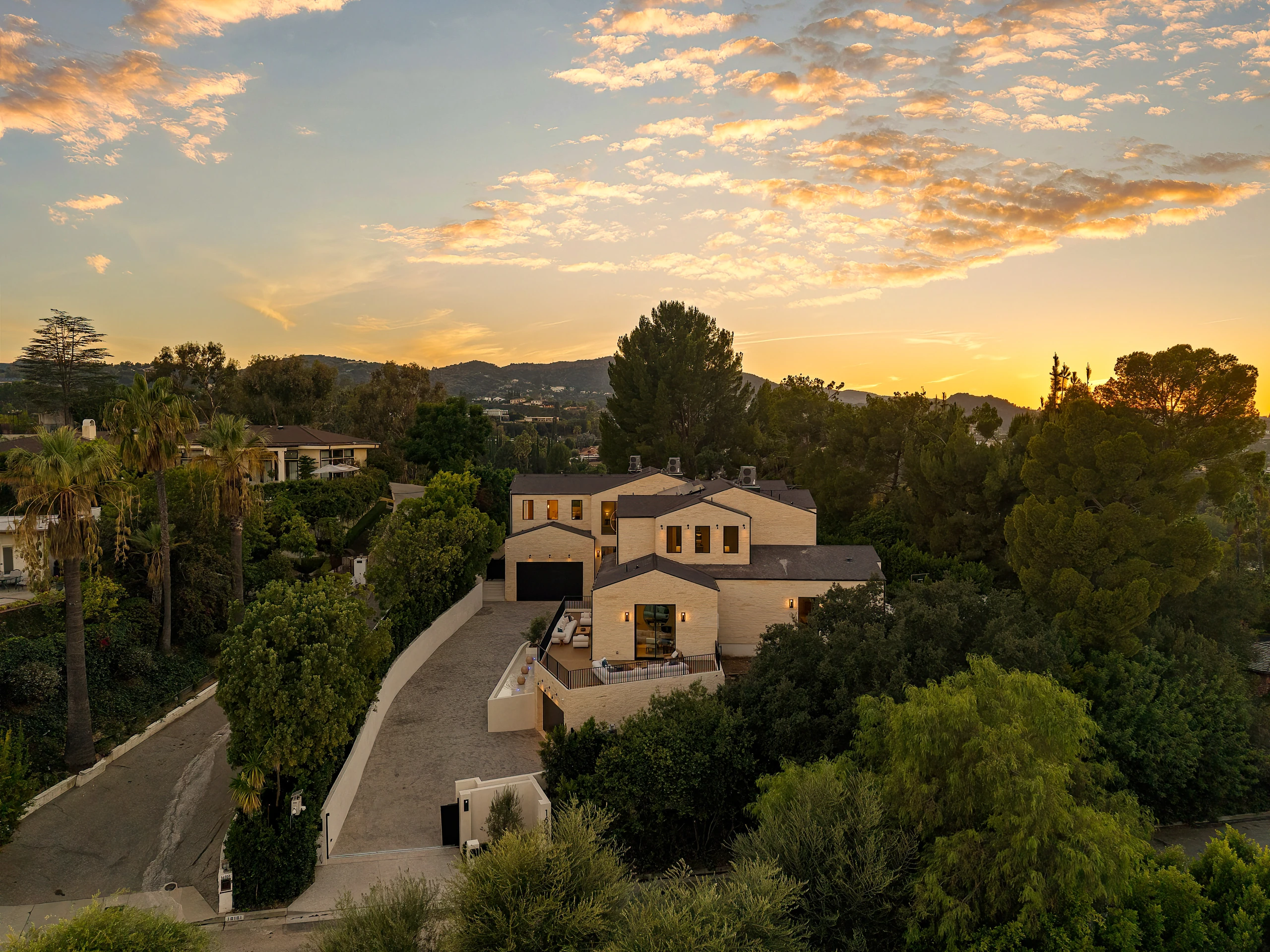 An aerial view of the estate at sunset