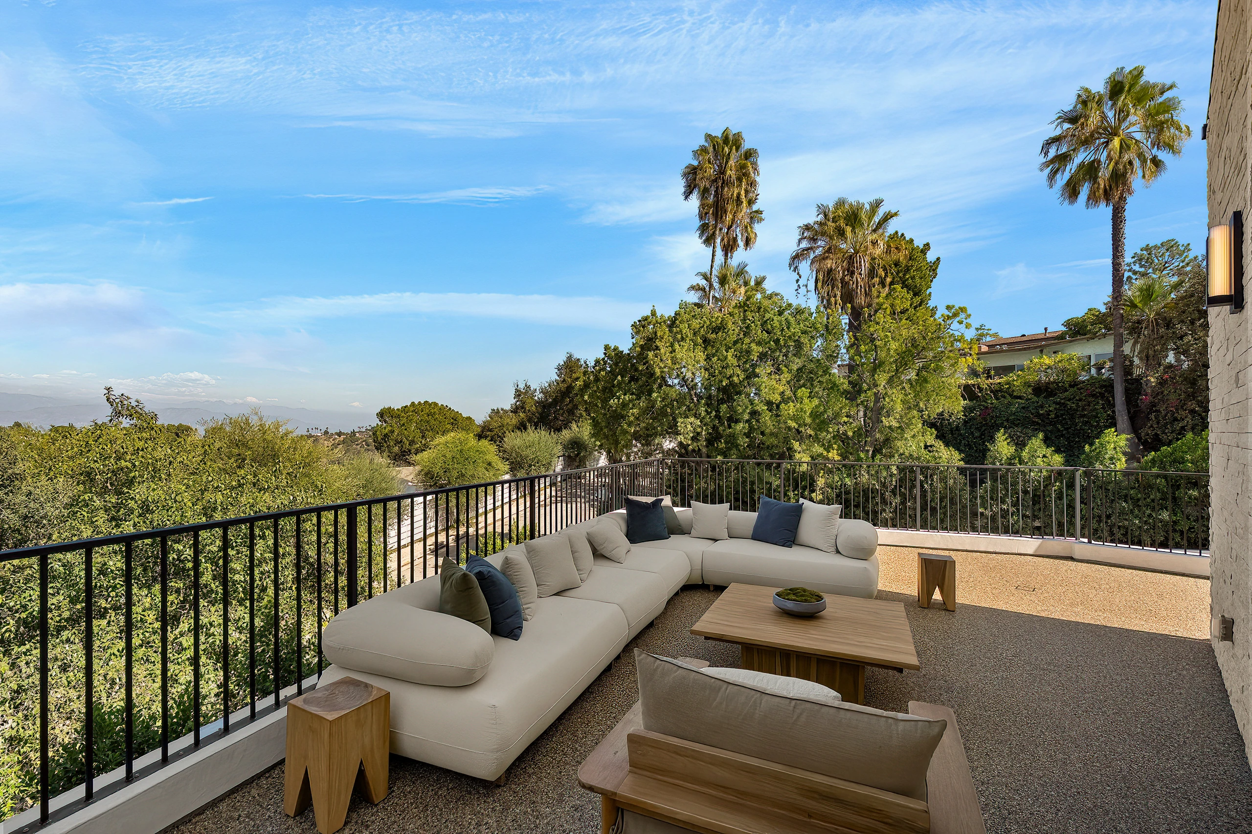 The balcony overlooking the surrounding trees