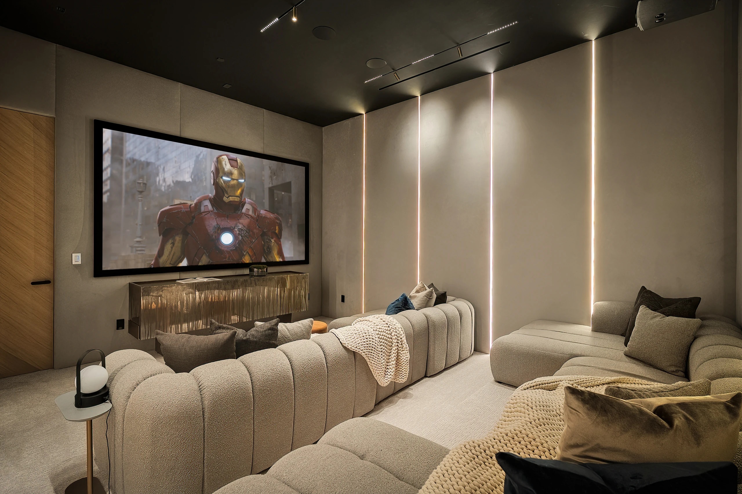The private cinema with the projection screen in use
