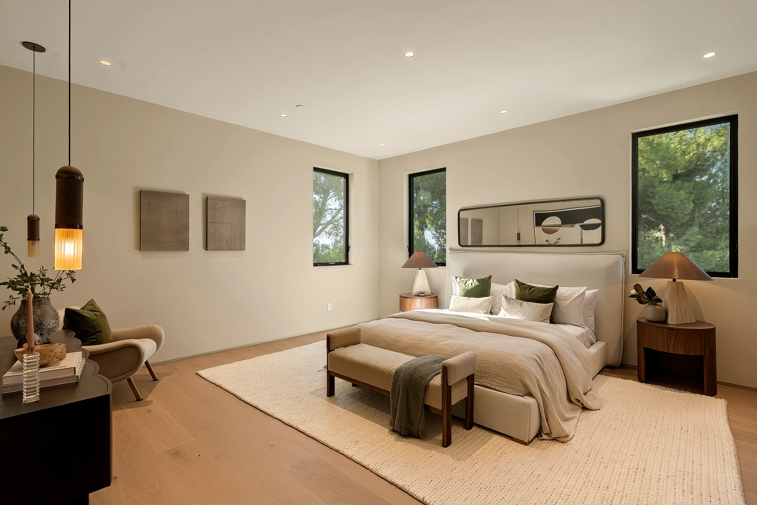 A secondary bedroom with garden views