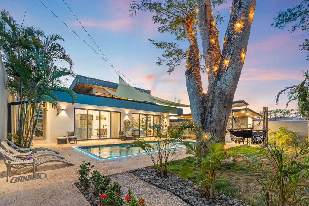 Villa Wahoo exterior pool area and tropical landscaping and garden