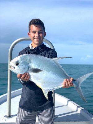 Fly fishing in belize, photo with a permit a common catch in Belize