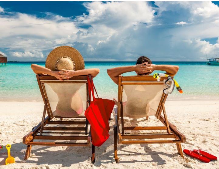 Retired couple on a beach in Belize - Belize residency