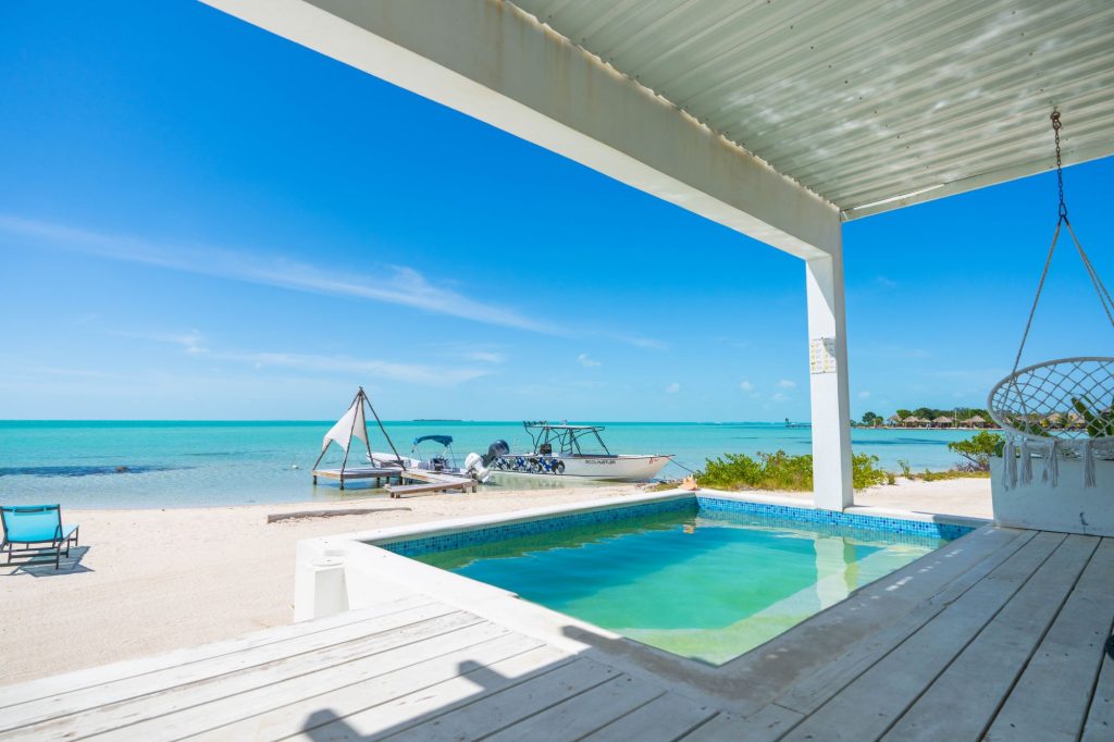 belize beachfront home for sale in secret beach. belize investment opportunity