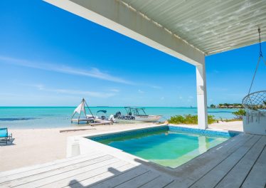 belize beachfront home for sale in secret beach. belize investment opportunity