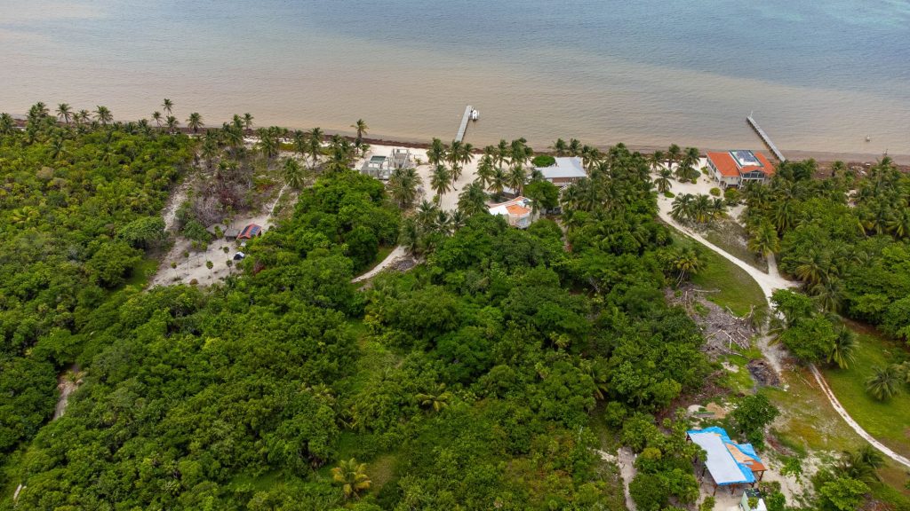 Aerial view of Parcel 8870 in Palmero Point, Ambergris Caye, showing common beachfront and turquoise sea in Belize
