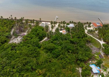 Aerial view of Parcel 8870 in Palmero Point, Ambergris Caye, showing common beachfront and turquoise sea in Belize