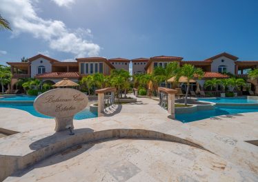 Front view of Belizean Cove Estates, home to Villa Del Mar, a luxury beachfront condo in Belize with Caribbean Sea views.