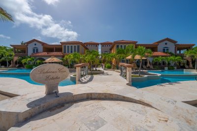 Front view of Belizean Cove Estates, home to Villa Del Mar, a luxury beachfront condo in Belize with Caribbean Sea views.
