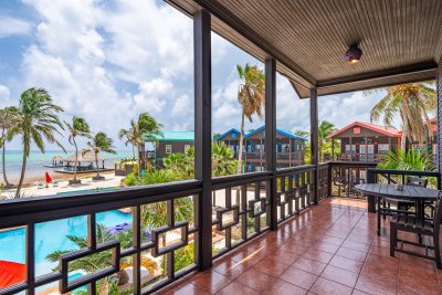 Ambergris Caye oceanfront condo view from balcony at X’TAN HA Resort overlooking the Caribbean Sea