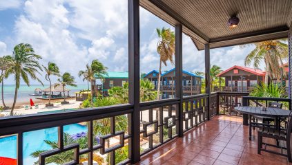 Ambergris Caye oceanfront condo view from balcony at X’TAN HA Resort overlooking the Caribbean Sea