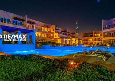Nighttime view of the pool area at The Phoenix Resort in San Pedro Belize