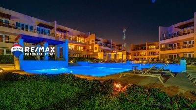 Nighttime view of the pool area at The Phoenix Resort in San Pedro Belize
