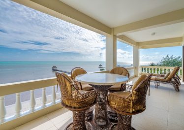 Ocean view from the balcony of a beachfront condo for sale in South Ambergris Caye, Belize