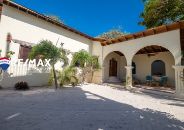 Front view of Casa El Fuerte home in San Pedro Belize near the beach