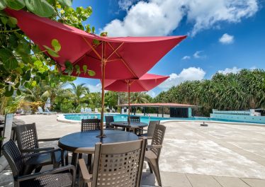 Resort-style swimming pool at Grand Baymen condos in San Pedro Belize