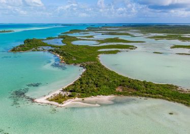 Aerial view of Parcel 9061, a west coast beachfront lot near Secret Beach, Ambergris Caye, Belize