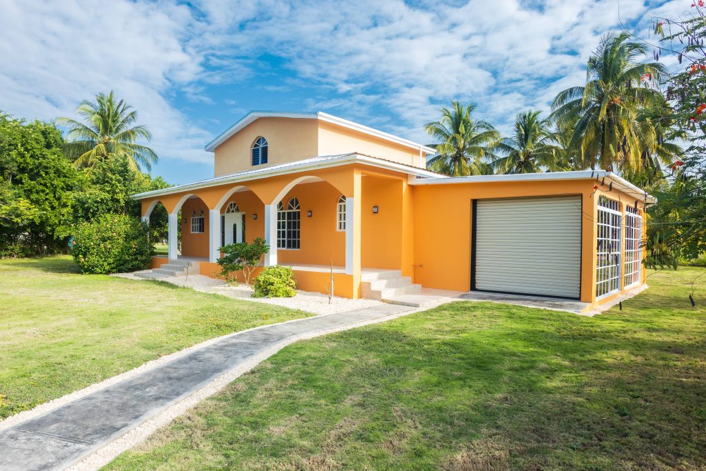 There is a quiet elegance to Villa Mango, a residence within the peaceful community of Consejo Shores