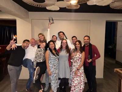 RE/MAX Island Real Estate team having fun while celebrating top Belize real estate agents at annual awards dinner