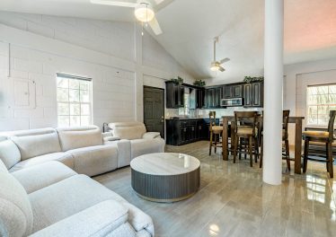 Spacious residential living room in upstairs 2-bedroom owner's quarters on Ambergris Caye