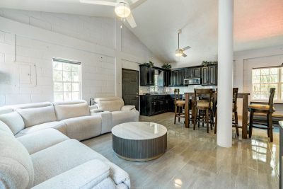 Spacious residential living room in upstairs 2-bedroom owner's quarters on Ambergris Caye