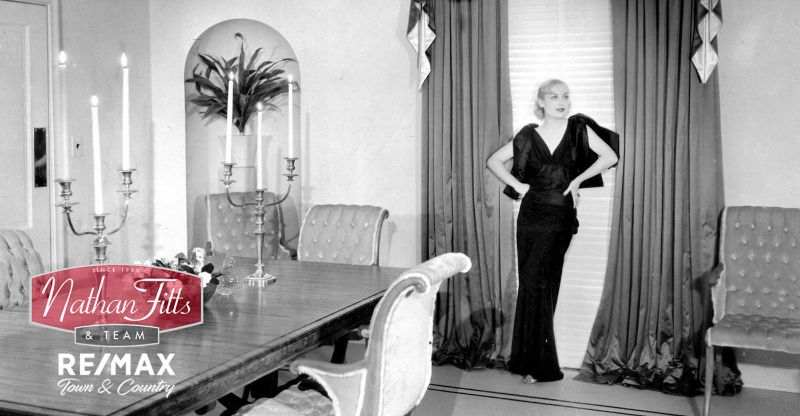 a woman wearing a black dress