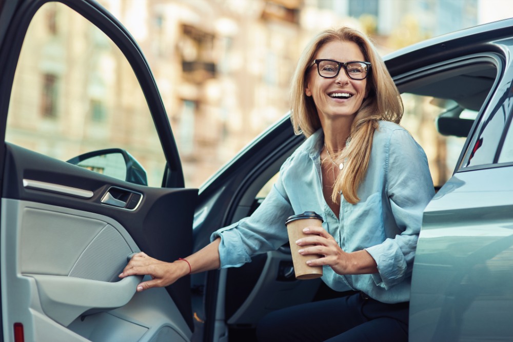 woman going out on car