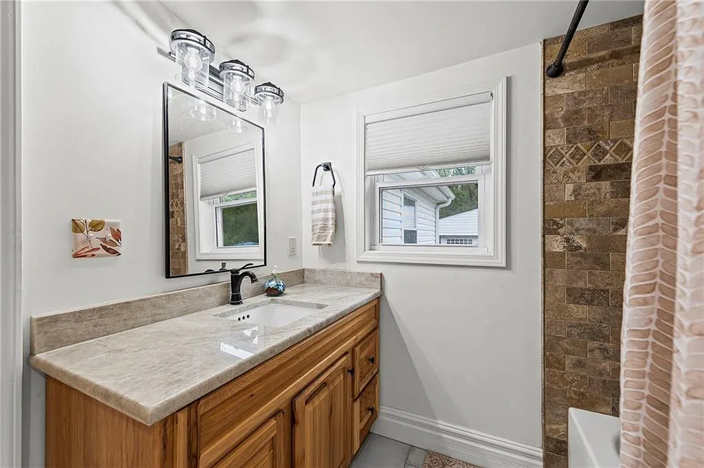 The updated full bath — 605 4th Street, Weston MO