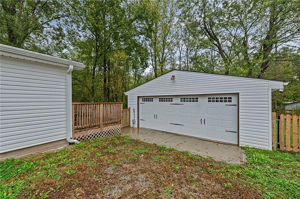 The detached two-car garage — real workshop space — 605 4th Street, Weston MO