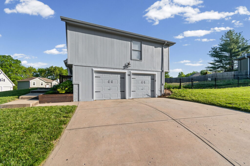 Two-car garage and a fenced corner lot at 7205 N Hickory Street