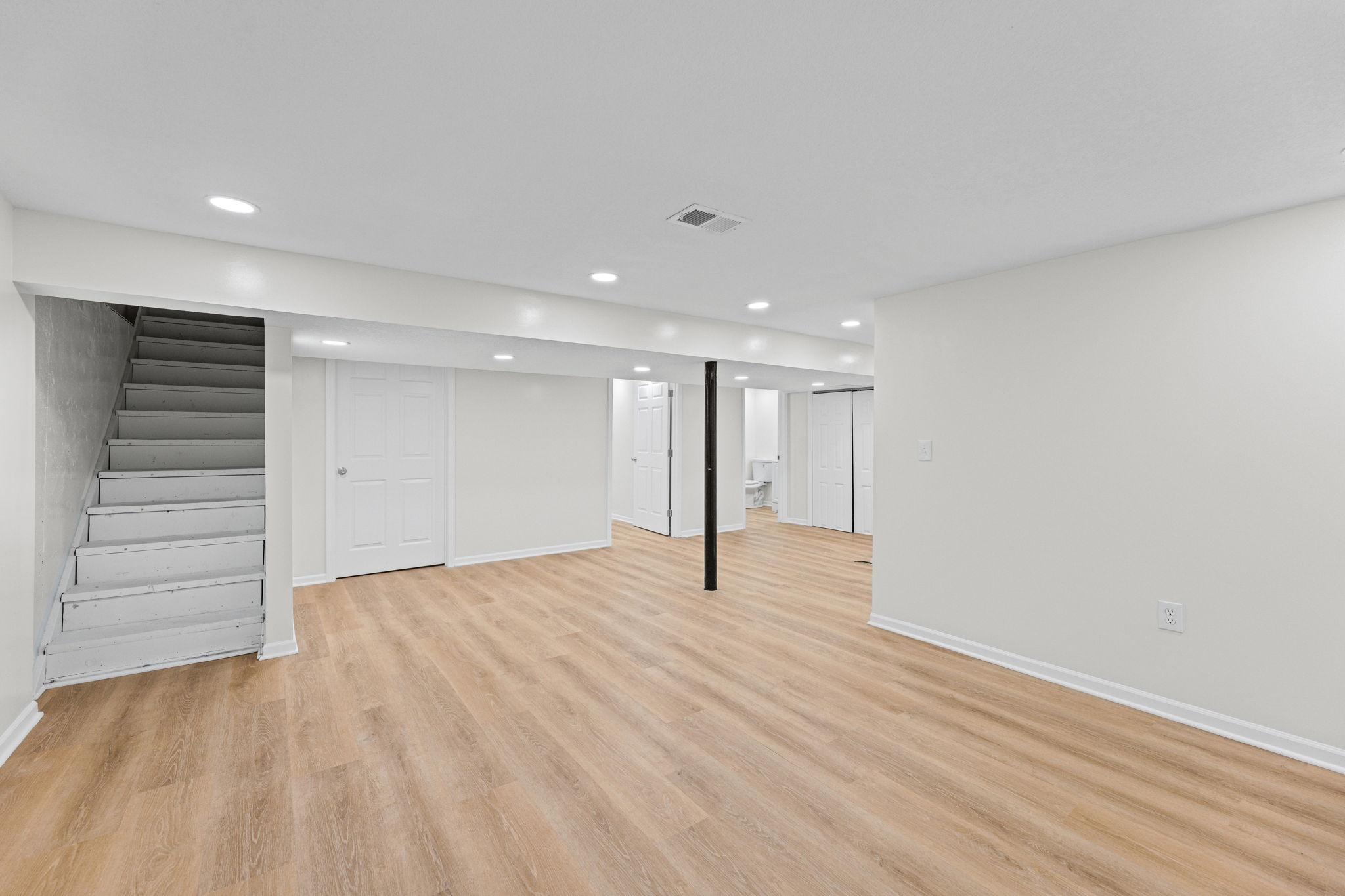 Spacious finished rec room on the lower level — 119 Sherri Lane, Excelsior Springs, MO