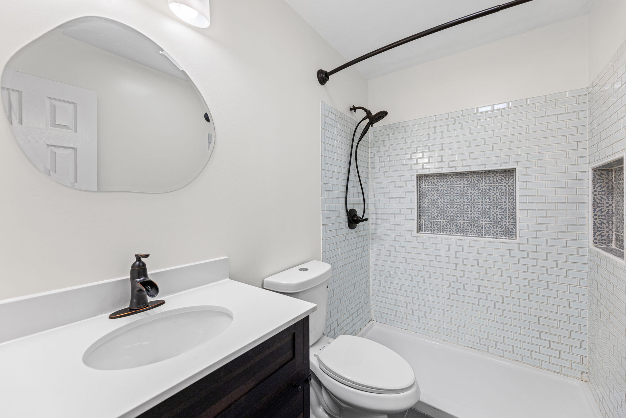 Fully updated bath with a tiled walk-in shower — 119 Sherri Lane, Excelsior Springs, MO