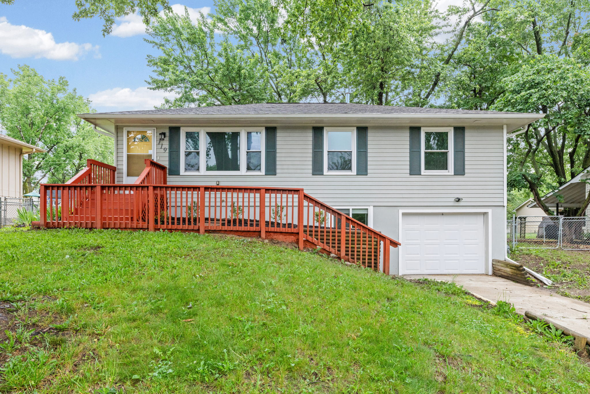 Front exterior of 119 Sherri Lane, a fully renovated raised ranch in Excelsior Springs, MO