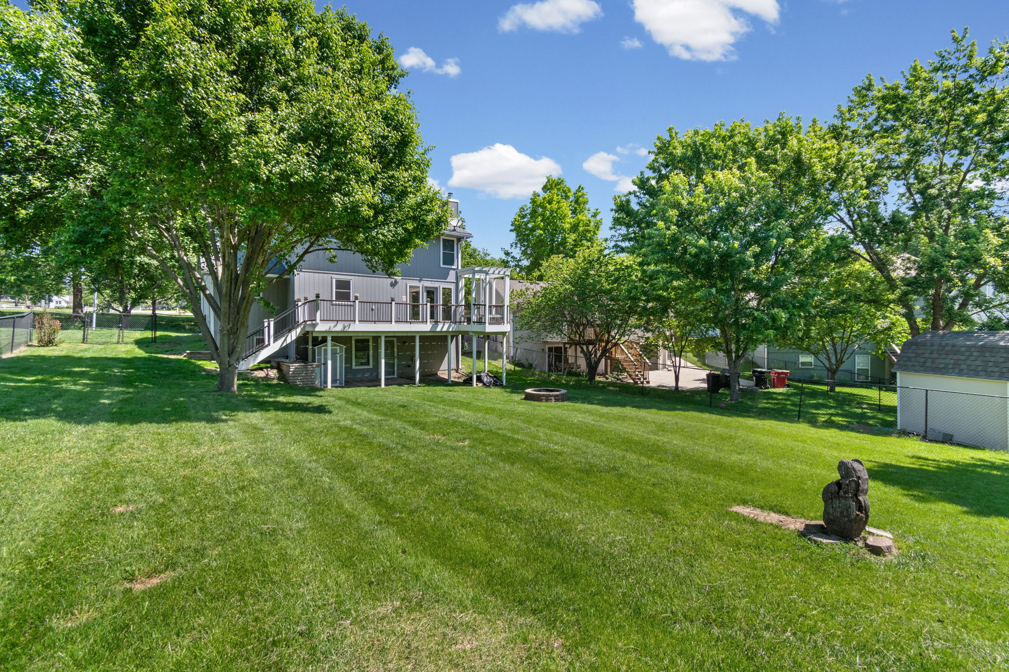 Spacious fenced backyard at 15801 E 2nd Street S, Independence, MO