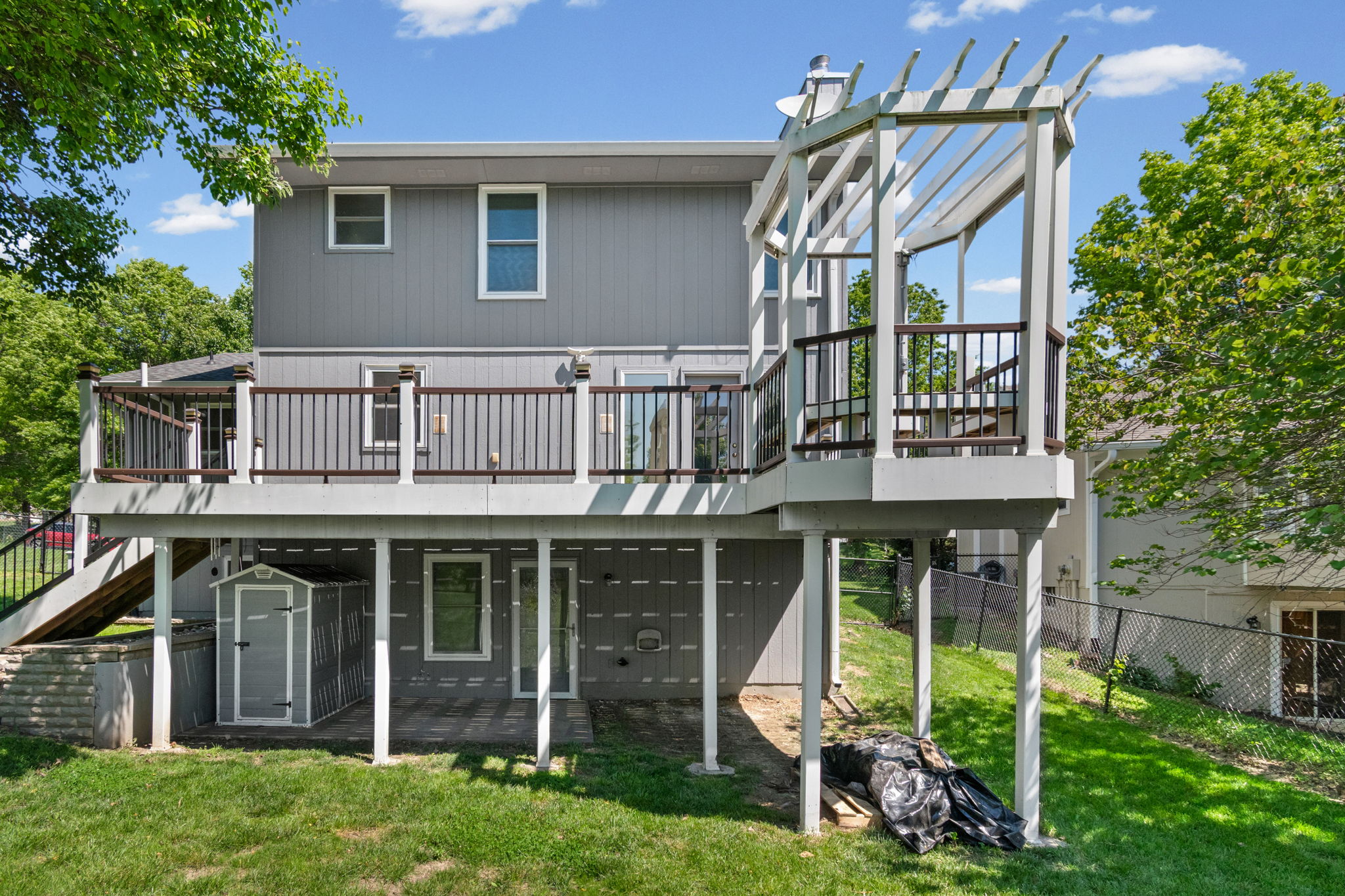 Back deck with built-in seating at 15801 E 2nd Street S, Independence, MO
