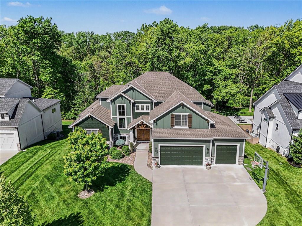 1784 Homestead Drive, Liberty MO — Craftsman curb appeal on a quiet Homestead street, backing to the trees.