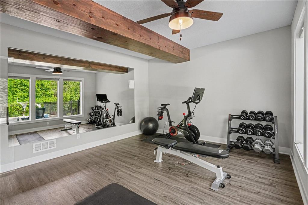 1784 Homestead Drive, Liberty MO — Lower-level gym that converts cleanly into a sixth bedroom.