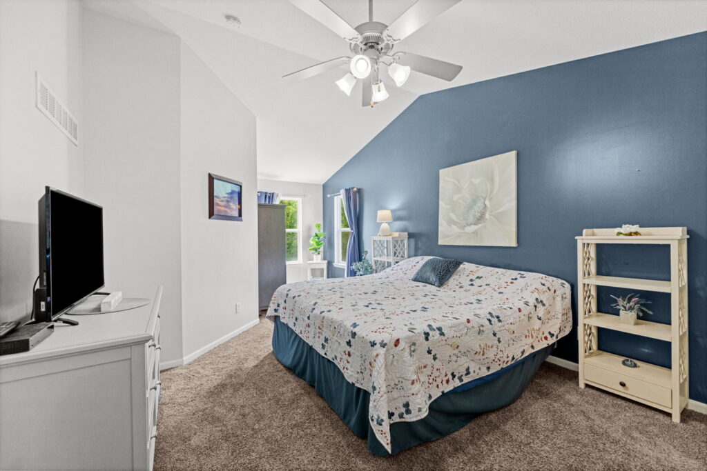 Vaulted main-floor primary suite