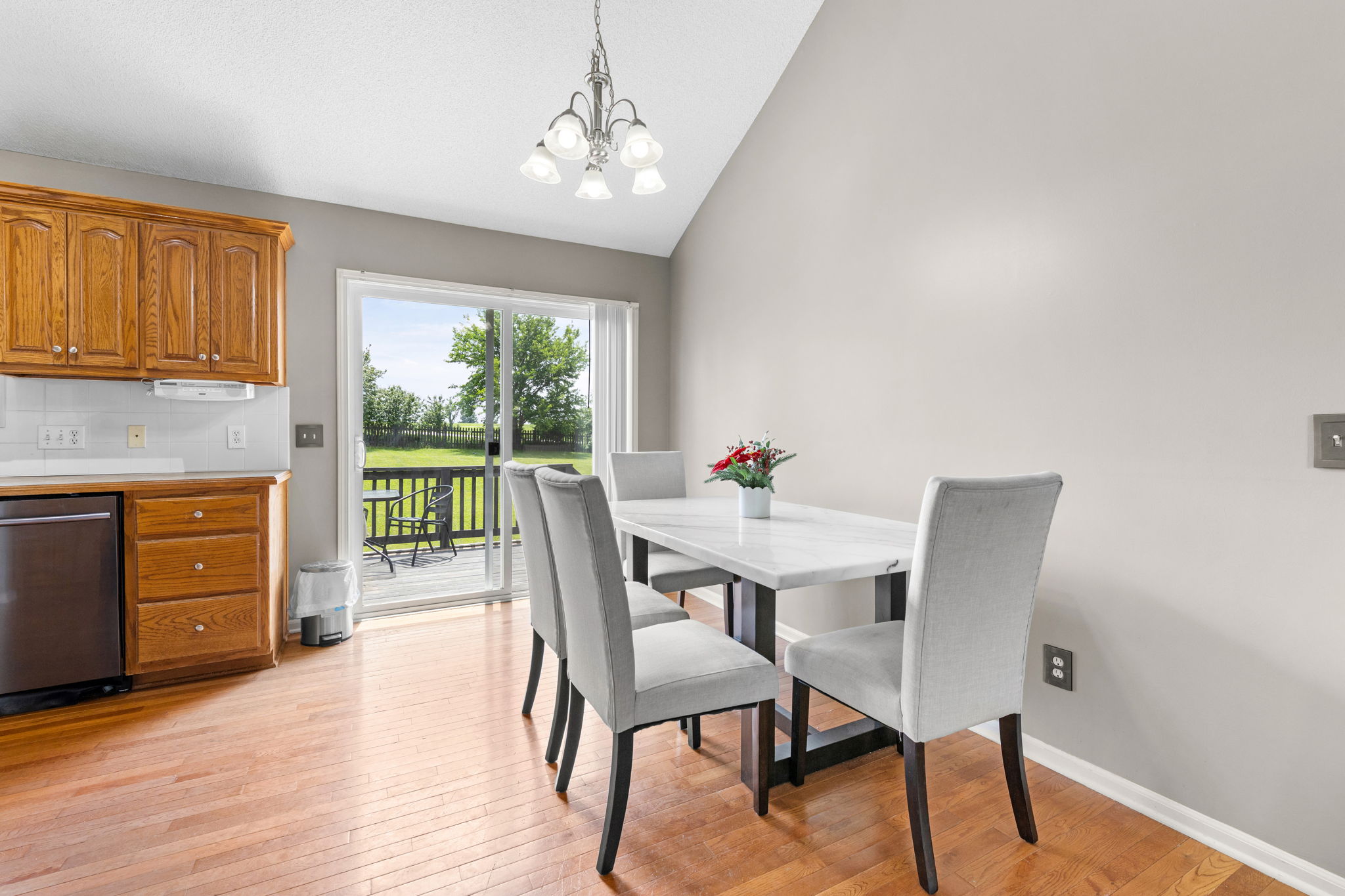 Dining area with sliding door to the deck, split-entry home in Kansas City