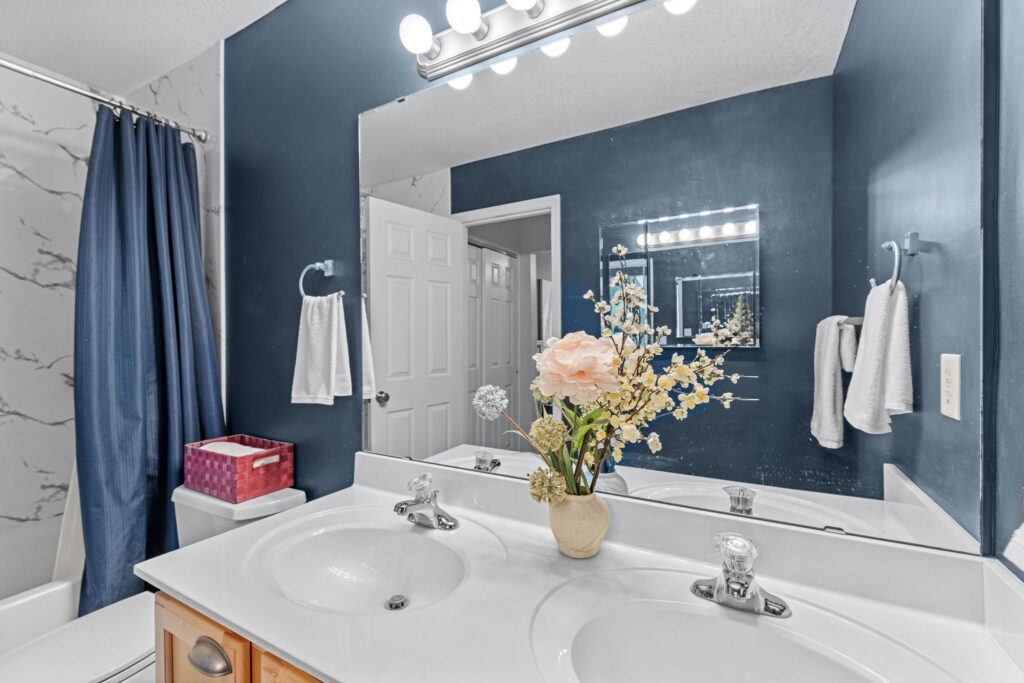 Updated full bathroom with new tub and shower surround