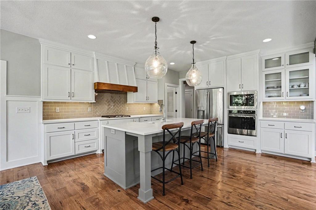 1784 Homestead Drive, Liberty MO — Gourmet kitchen with a quartz island and double ovens.