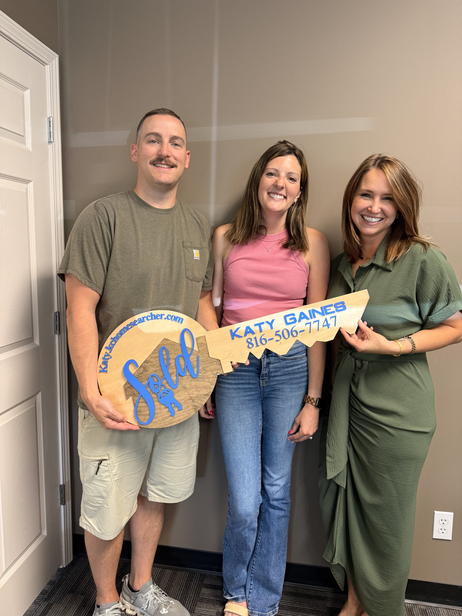 The Zachariah family at closing — 27455 Stephanie Lane, Weston MO