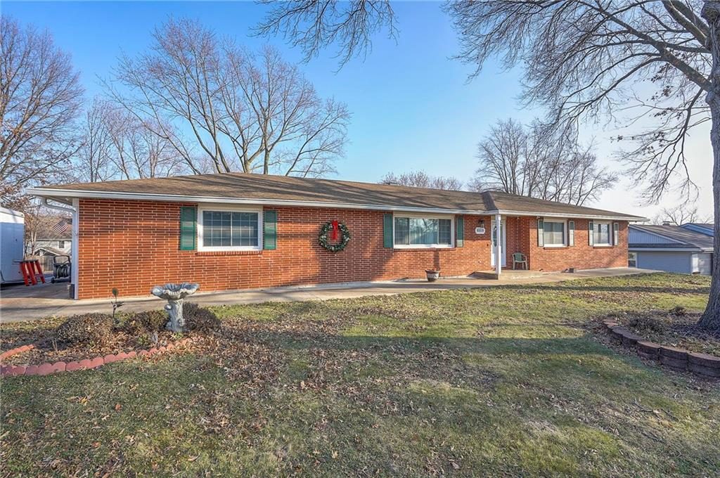 Brick ranch home at 6509 NW Twin Oaks Drive in Skyline Estates, Kansas City, MO