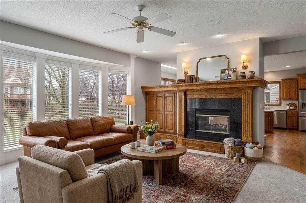 Great room with floor-to-ceiling windows and see-through fireplace, Hills of Monticello Parkville MO