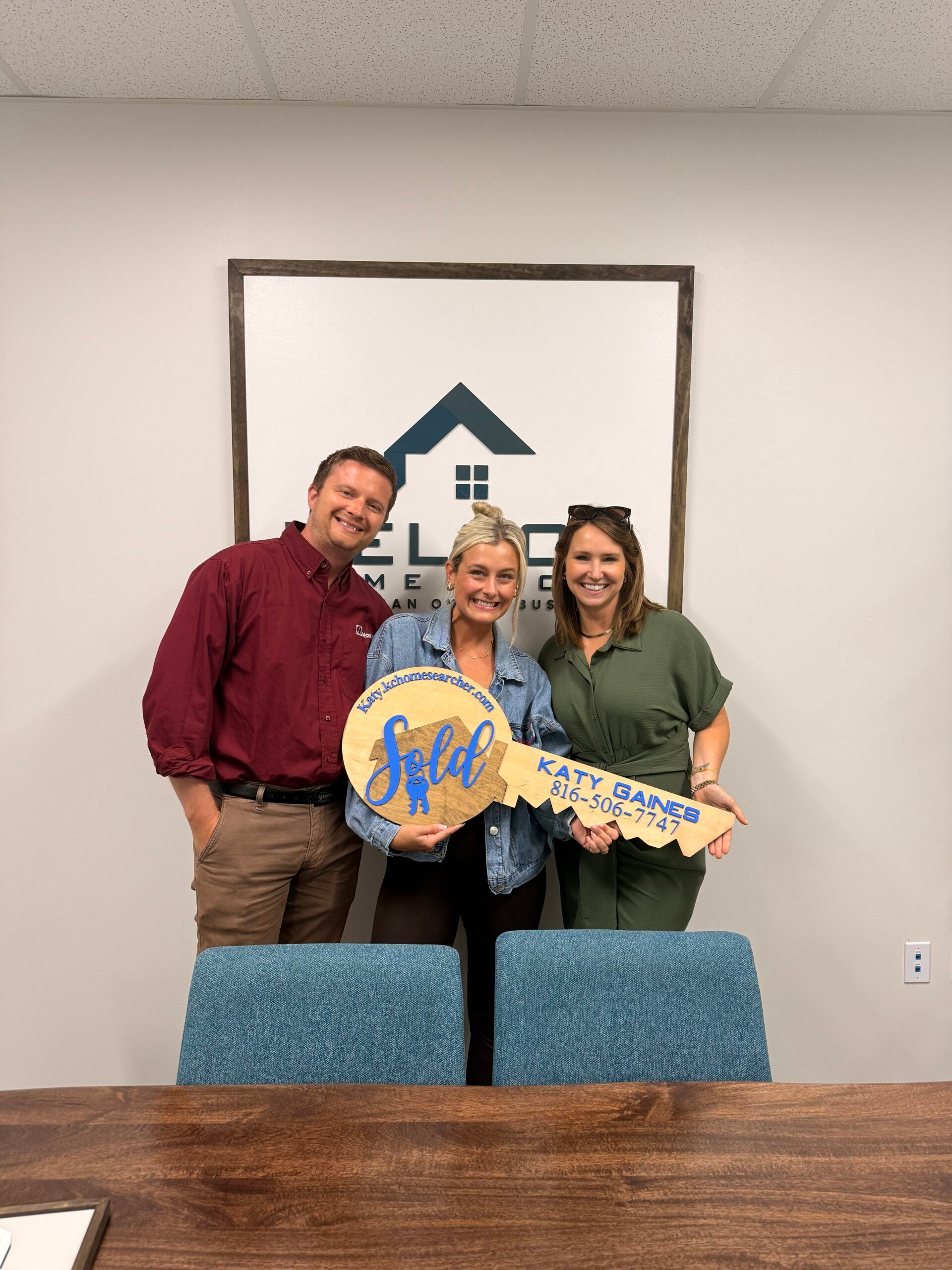 Adrianne and Nick with Katy Gaines on closing day in Parkville MO