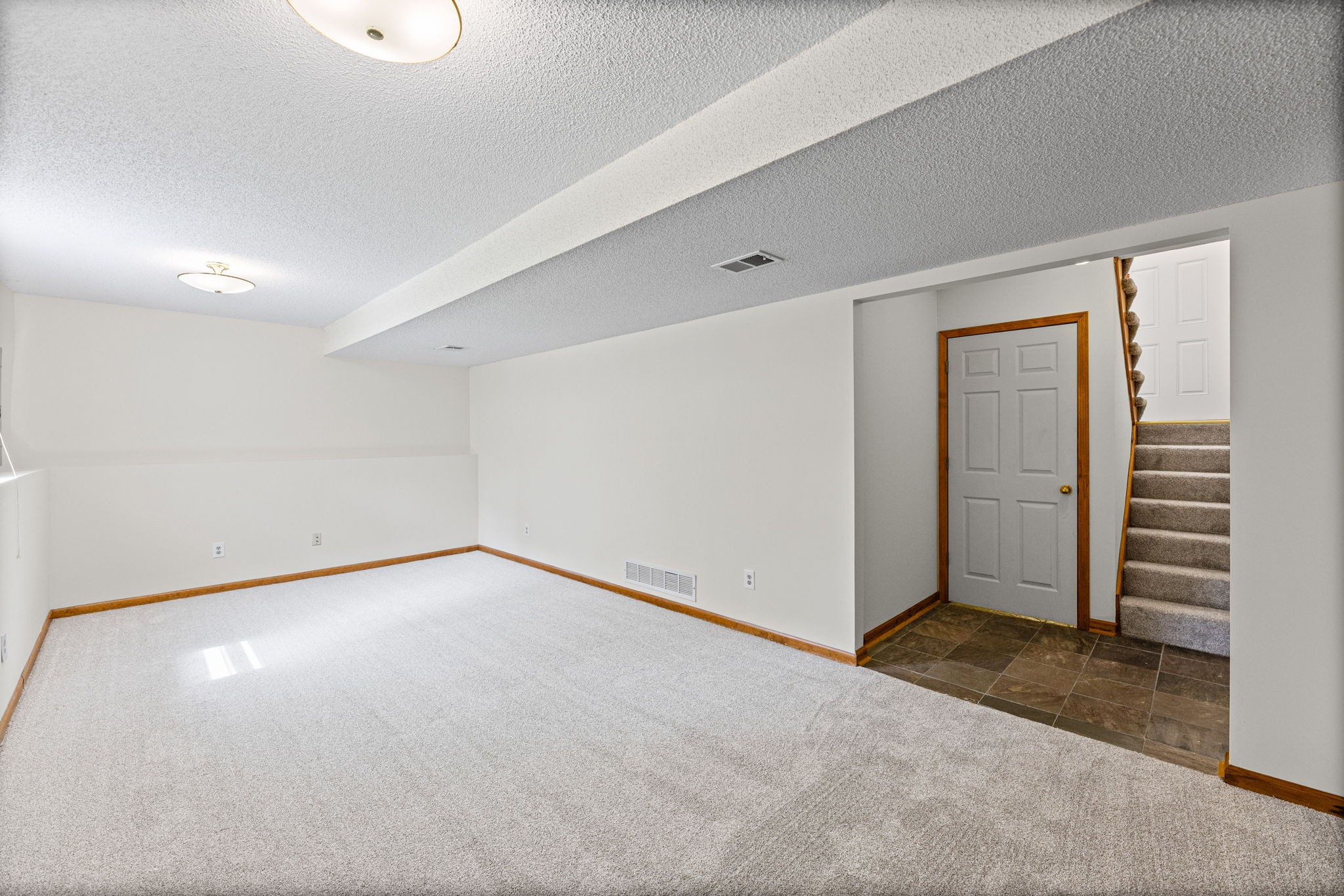 Finished daylight basement rec room at 6409 Chouteau Street, Shawnee KS