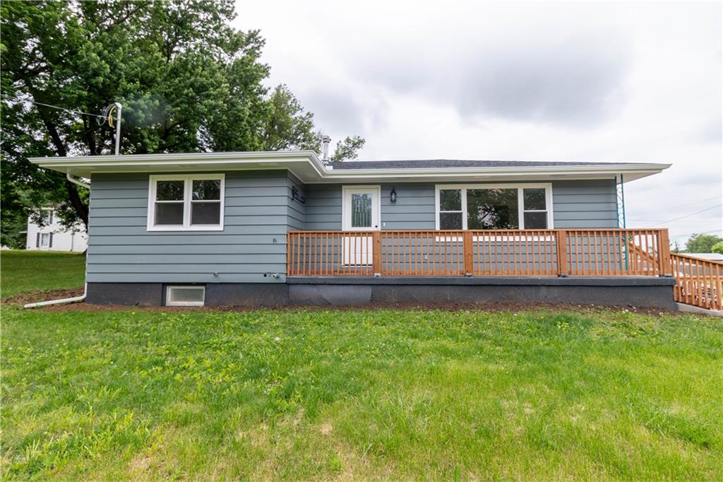 Remodeled blue raised ranch with new front deck at 200 Cherry Street, Maysville, MO